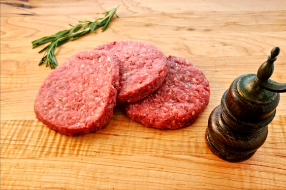 Proper Meats Steakburger Patties, stacked quarter pound beef patties